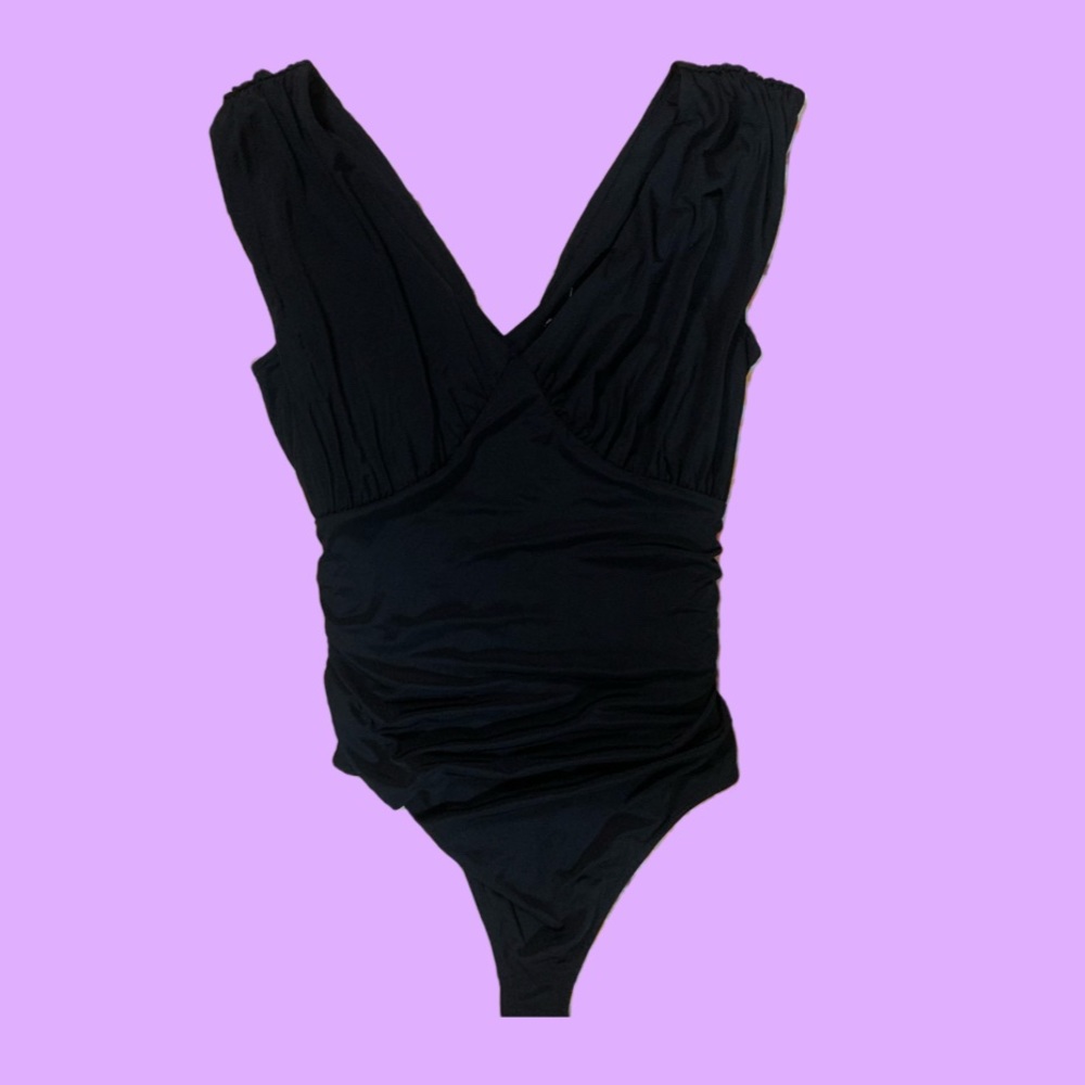 Express ruched black body contour bodysuit in size small.